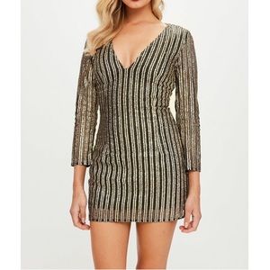 Black and gold striped sparkly dress